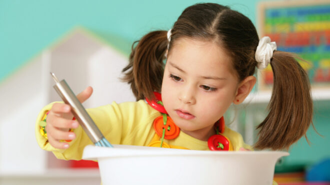 little girl mixing food
