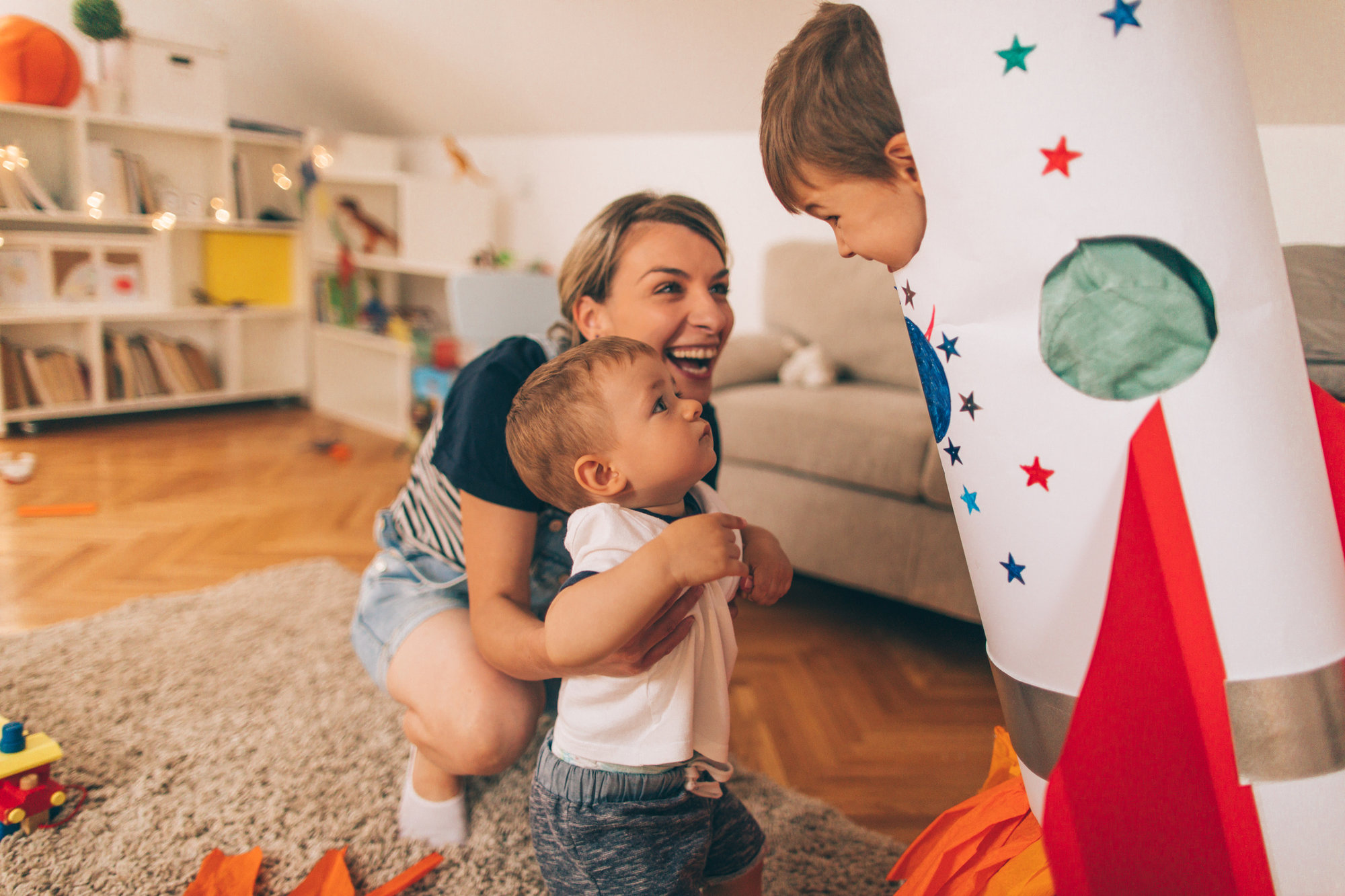 Mom and sons playing