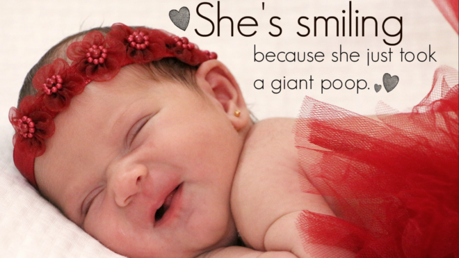 smiling newborn baby girl