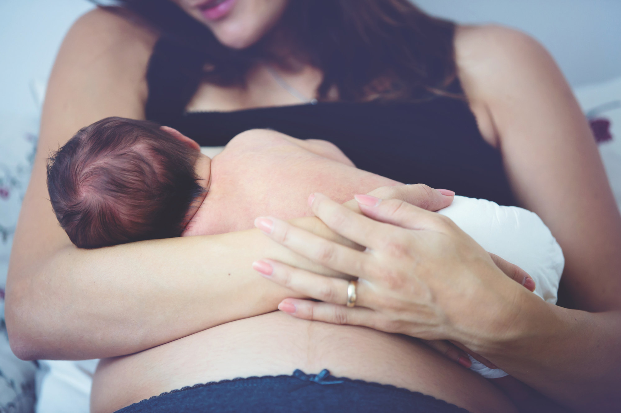 mom breastfeeding baby