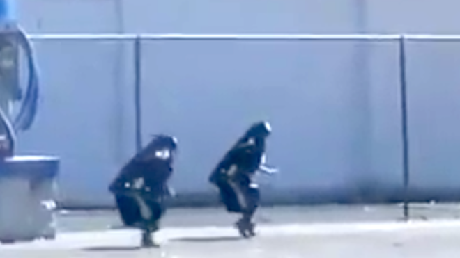 kids running around parking lot in car seats