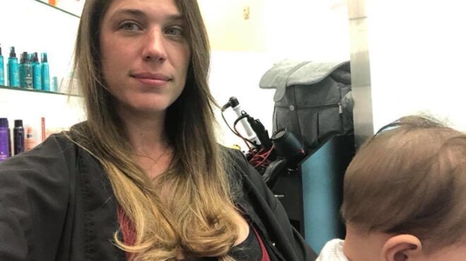 Mom breastfeeding at hair salon