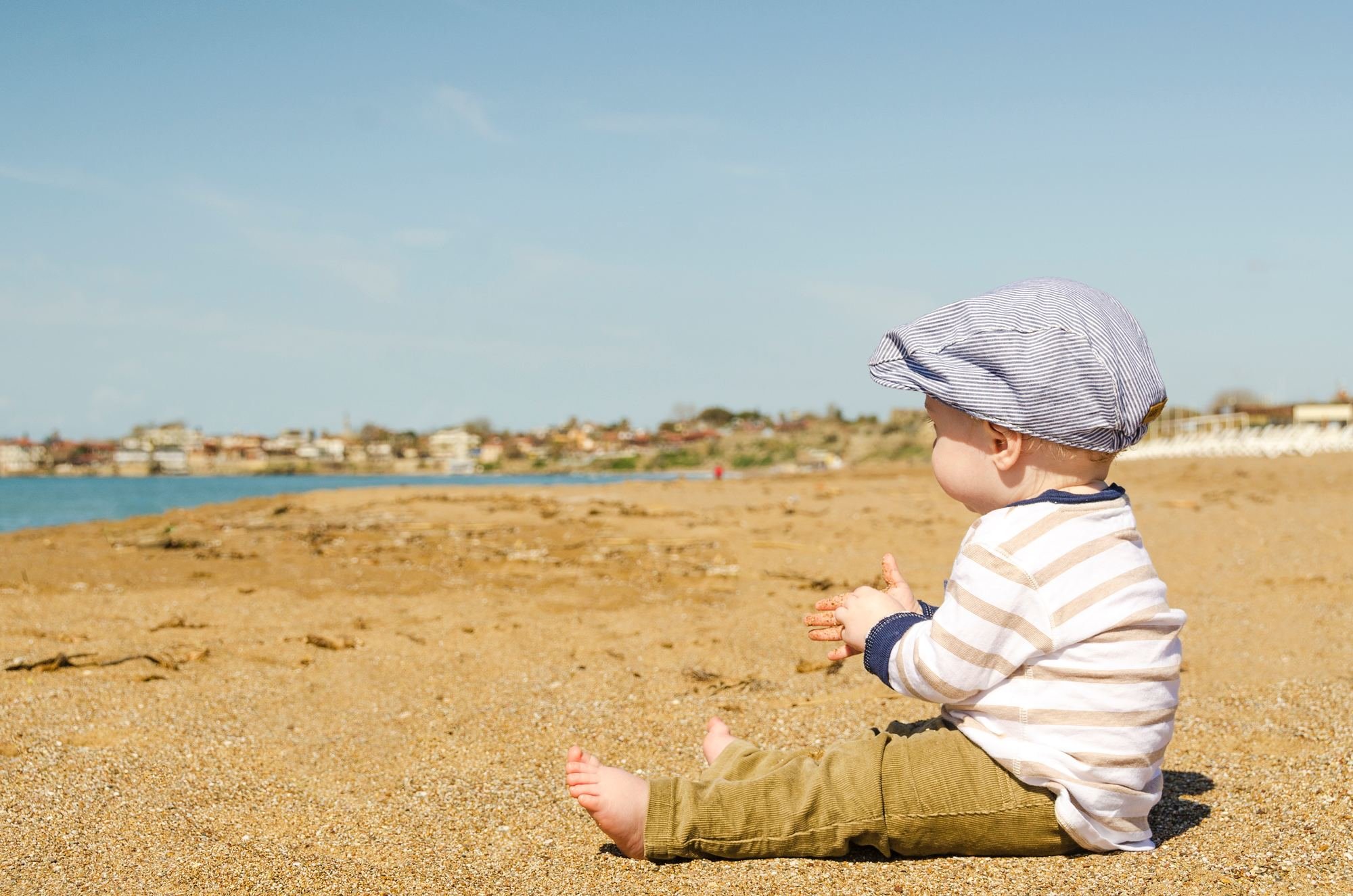 baby boy on beach