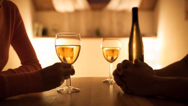 man and woman having drinks