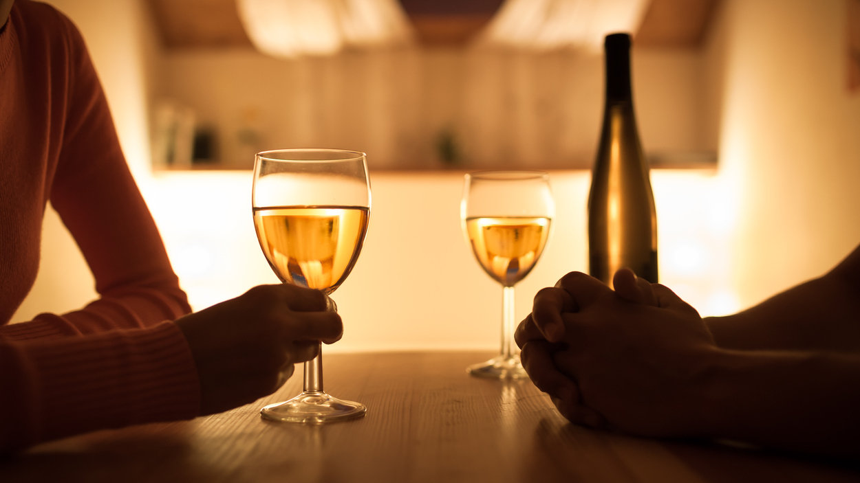man and woman having drinks