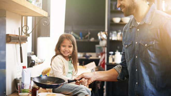 dad flipping pancakes