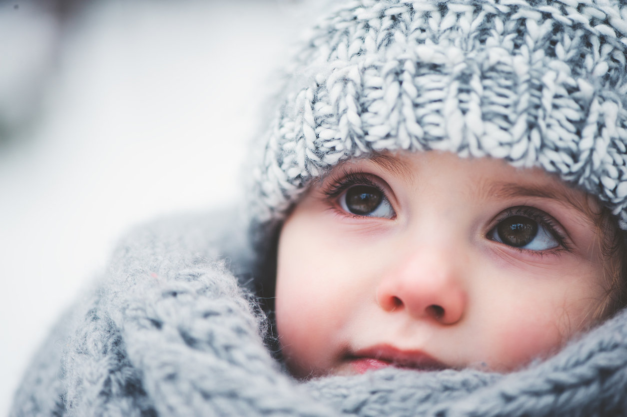 little girl bundled up wintertime