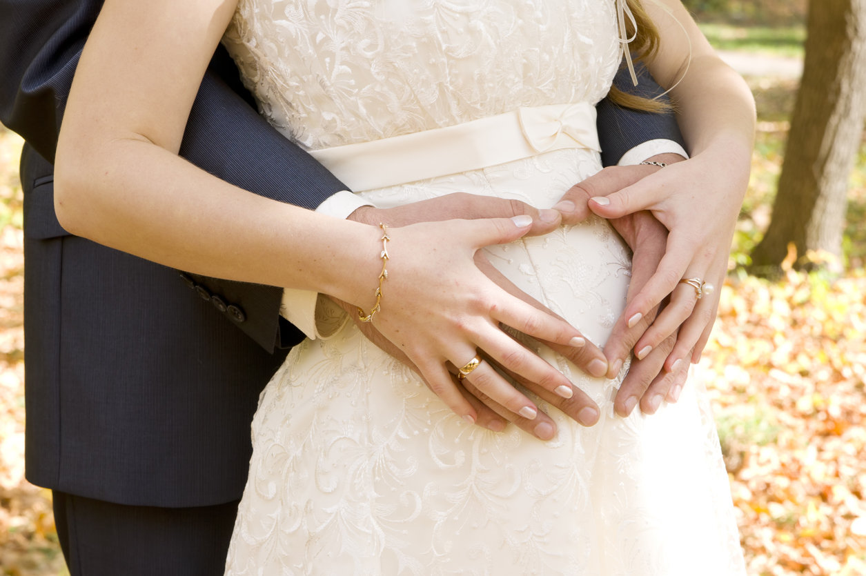 Pregnant bride wedding day