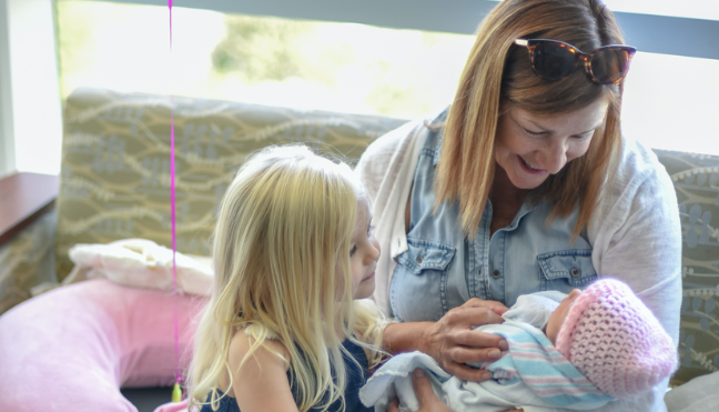 grandma meeting new baby