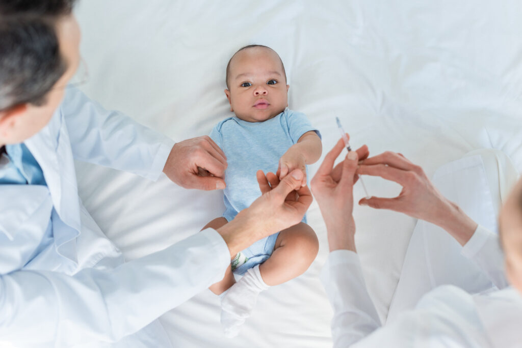 baby being vaccinated
