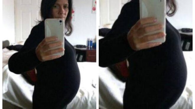 Josephine Clinton takes a selfie in her bedroom mirror to show her growing belly.