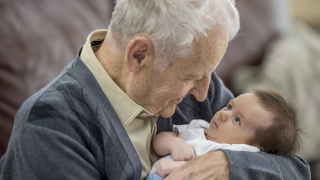 gpop holding newborn baby