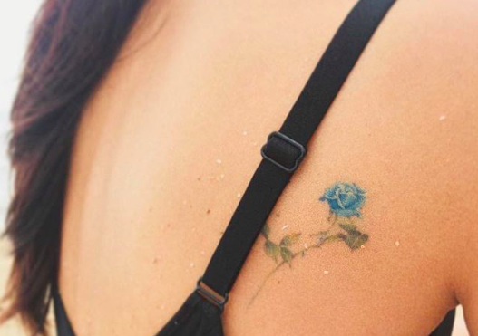 blue flower tattoo