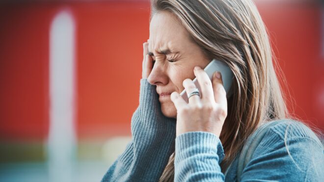 woman upset on phone