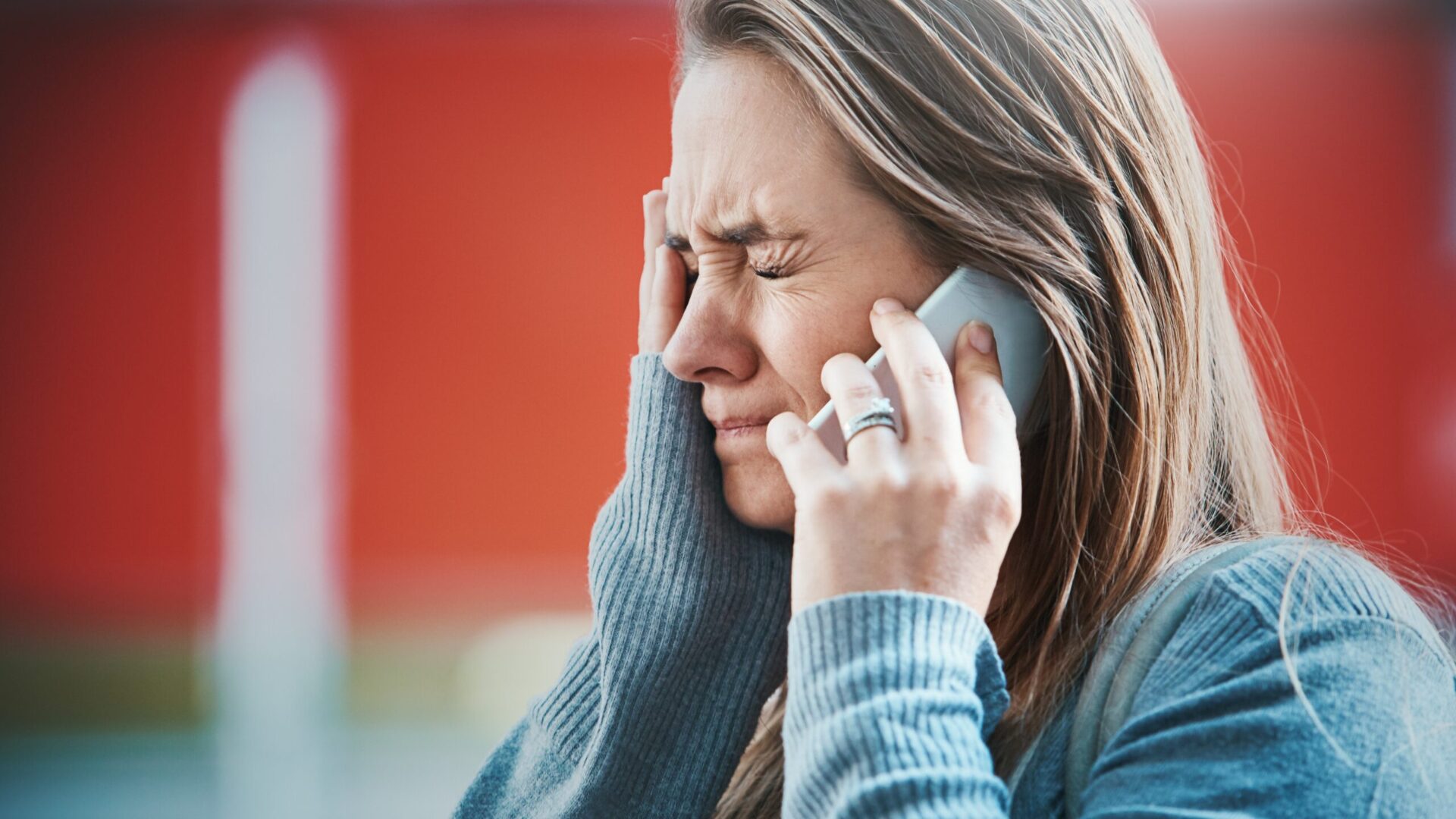 woman upset on phone