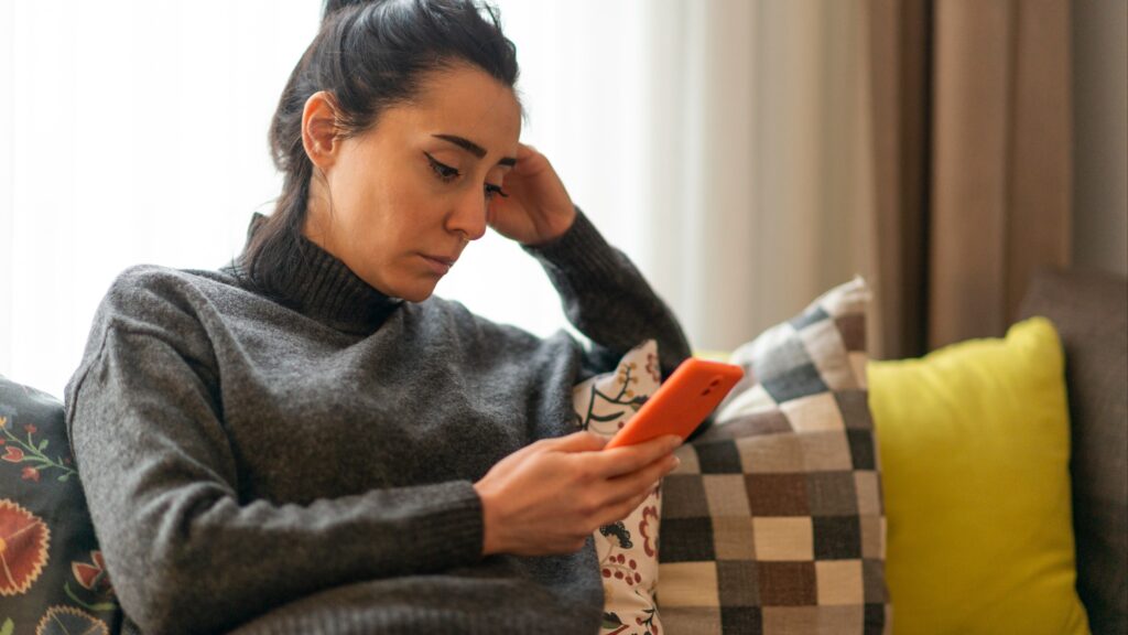 woman on the phone upset
