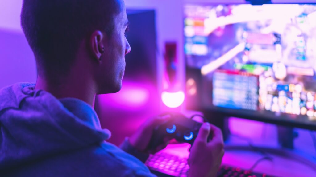 man gaming computer