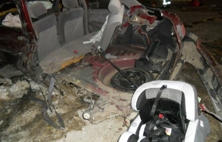 The car seat, still buckled up