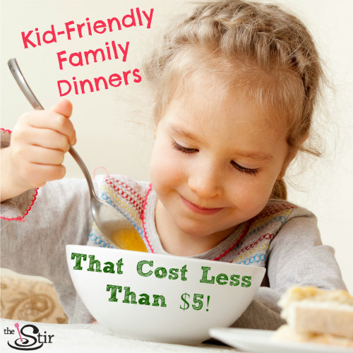 little girl eating a bowl of soup