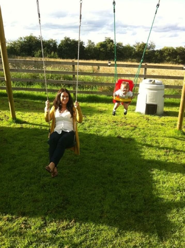 mom and baby on swings