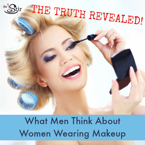 woman putting on makeup