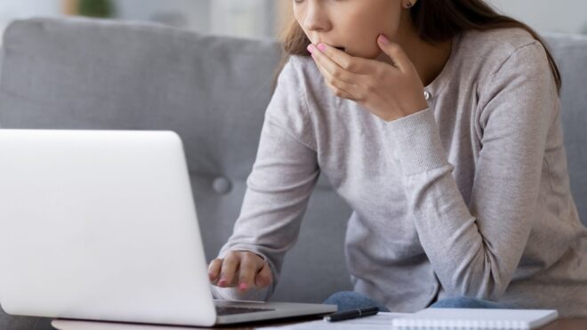 woman surprised computer