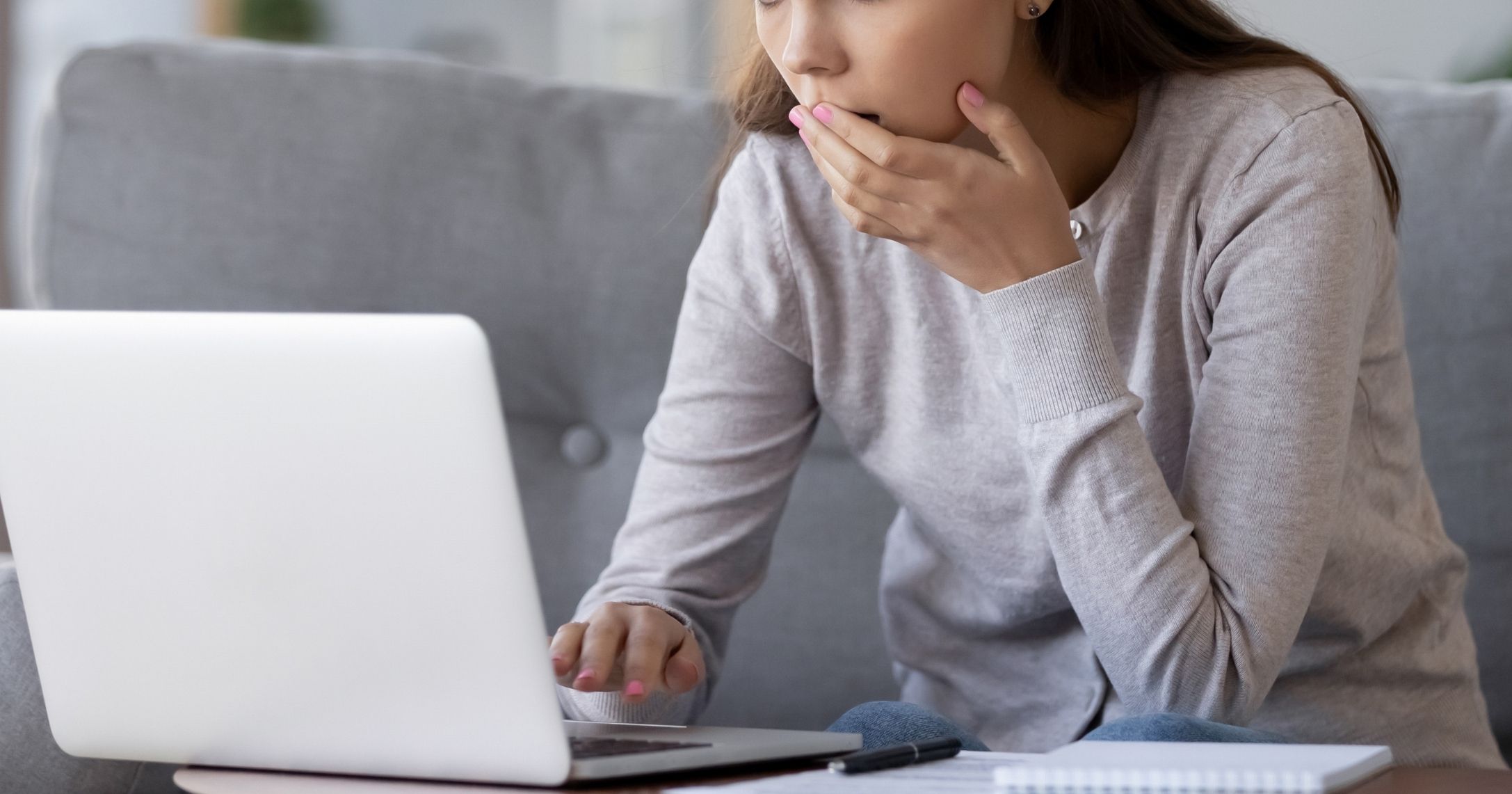 woman surprised computer