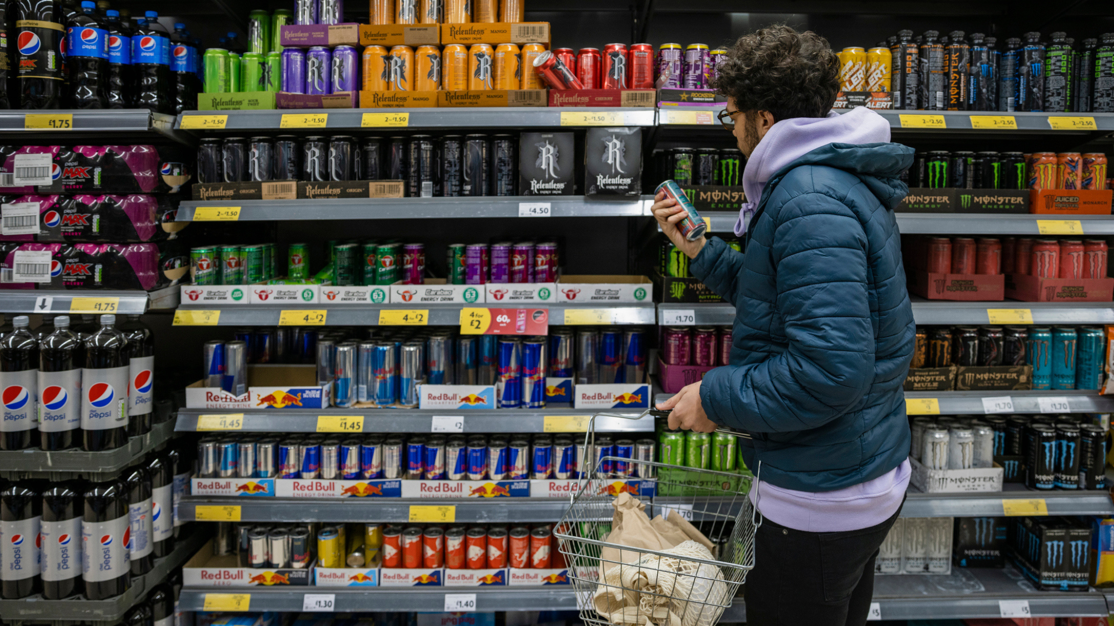 Man buying energy drinks
