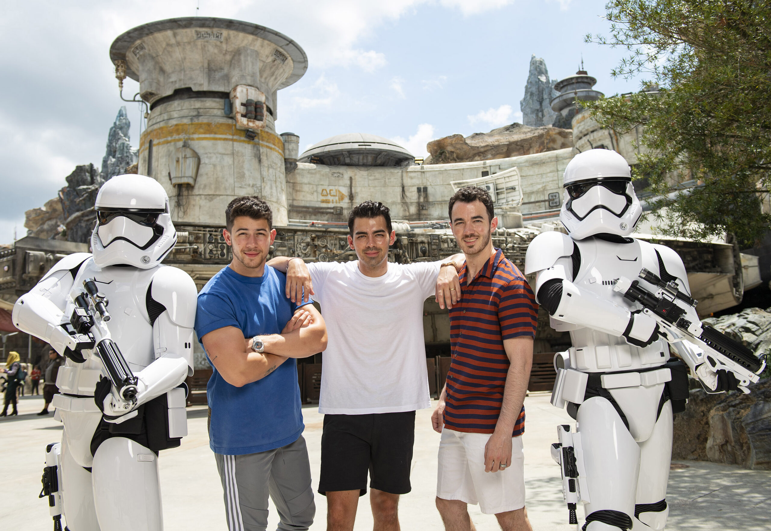 The Jonas Brothers Visit Star Wars: Galaxy's Edge At Walt Disney World Resort