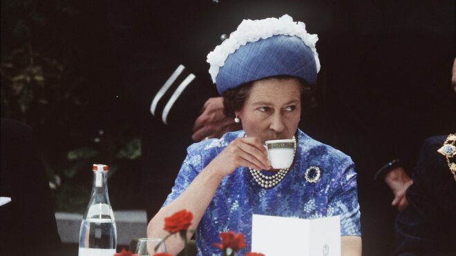 Queen Elizabeth drinking tea
