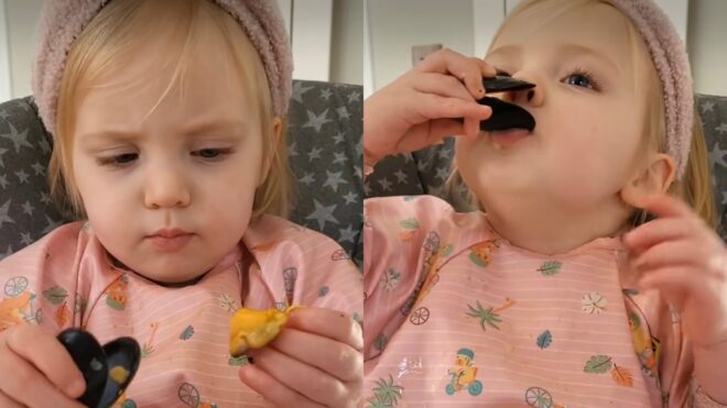 Hallie Archibald toddler eating mussels