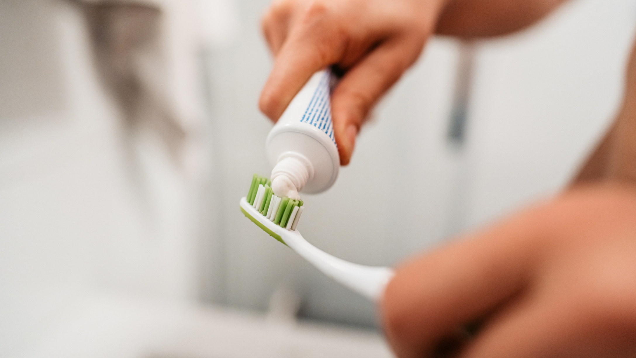 Hand with toothbrush