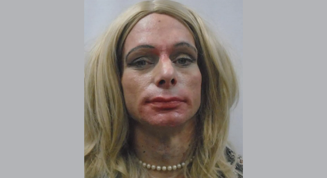Joshua Freyermuth wearing blond wig and makeup in mug shot