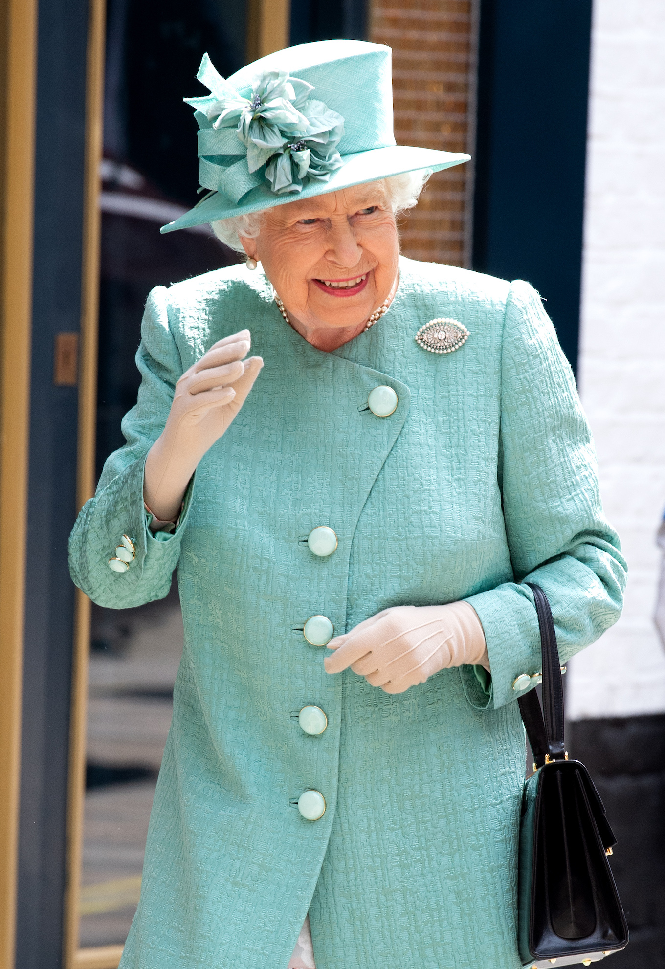 The Queen Visits A Replica Original Sainsbury’s Store In Covent Garden