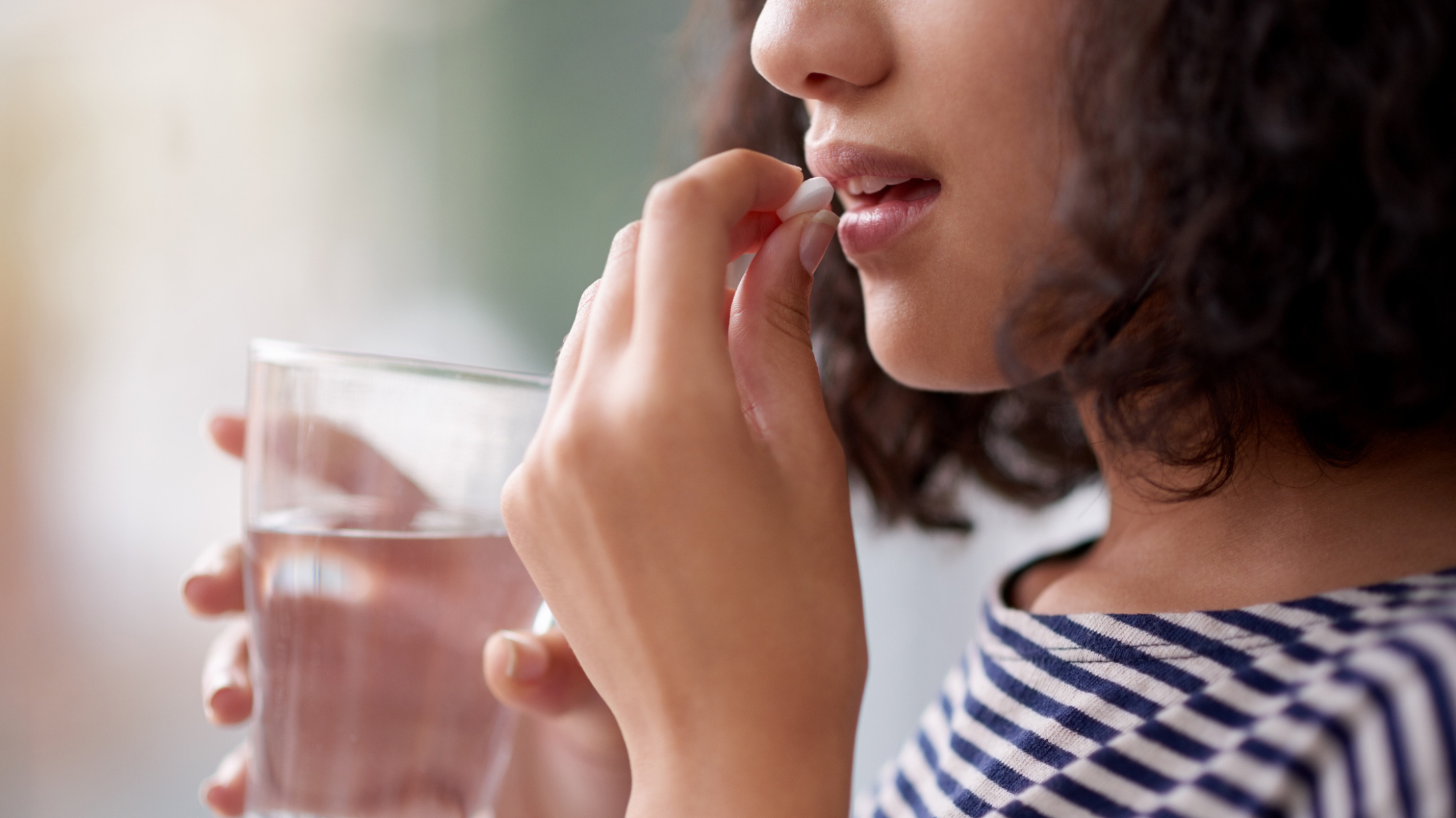 Teen taking medication