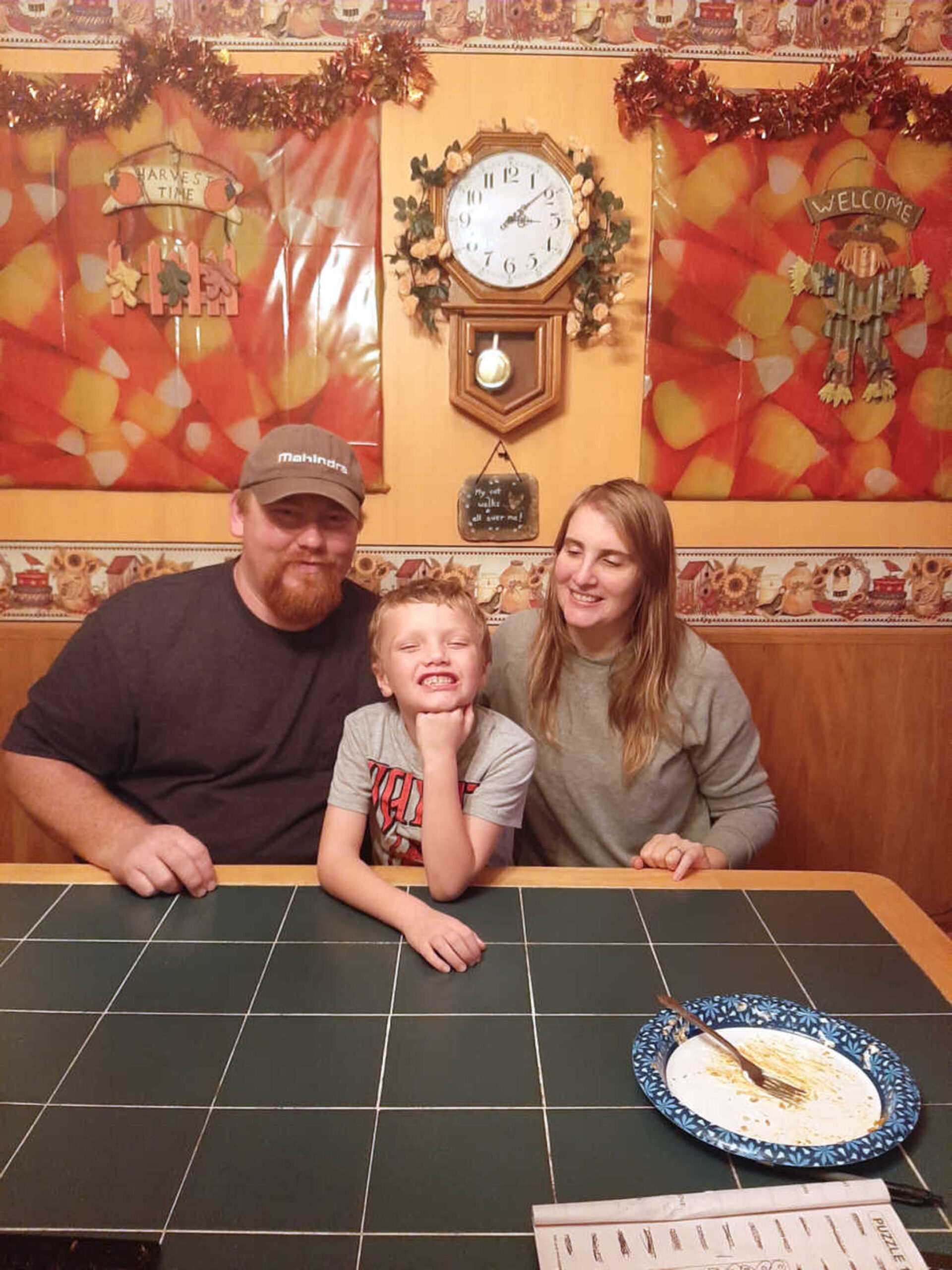 adoptive-parents-sit-with-son-900x1200-1.jpg