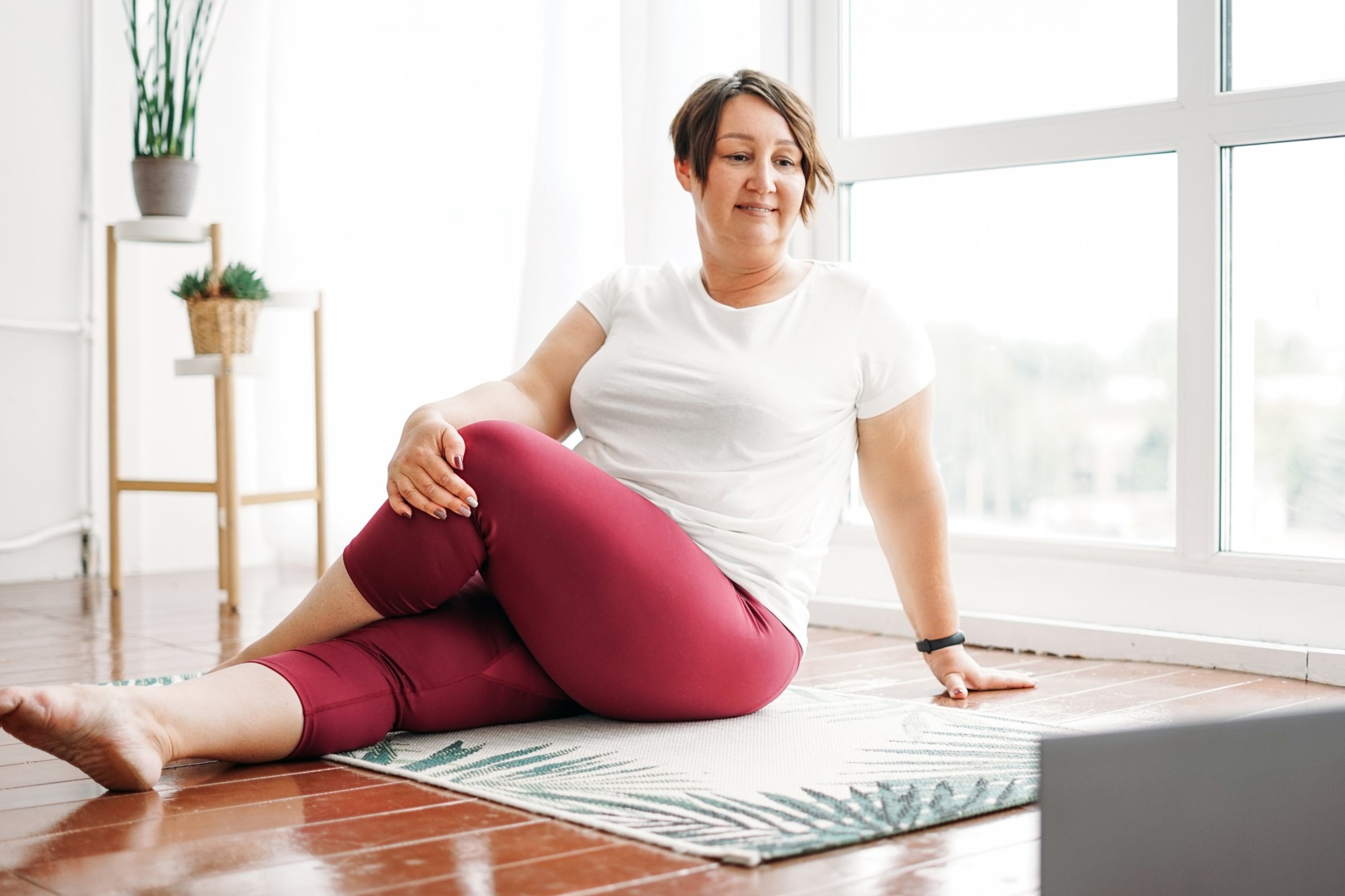 adult-charming-brunette-woman-plus-size-body-positive-practice-yoga-with-laptop-at-home_t20_gLLGBz.jpg