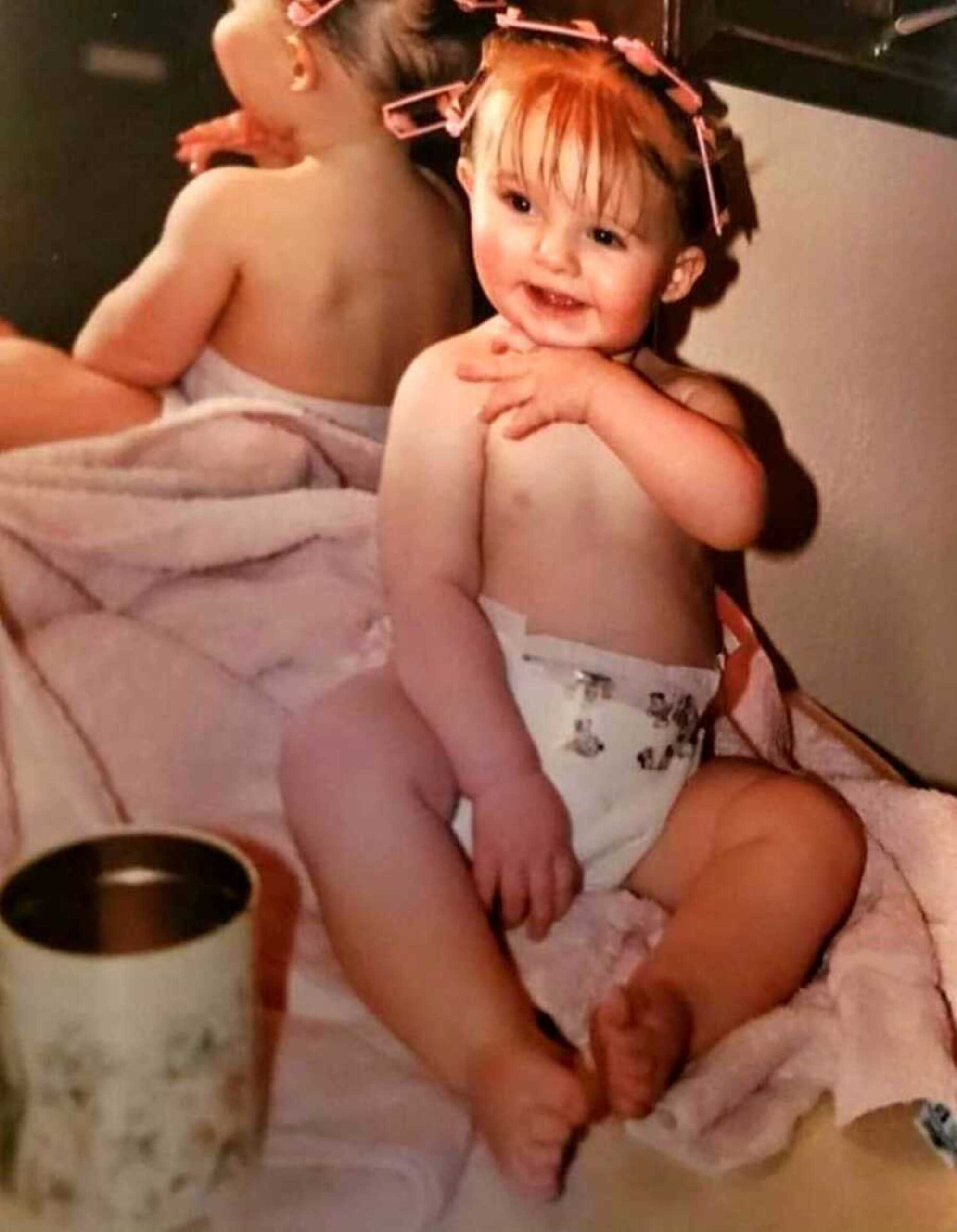 baby-sitting-on-pink-blanket-cropped-633b5b55e118f-900x1158-1.jpeg