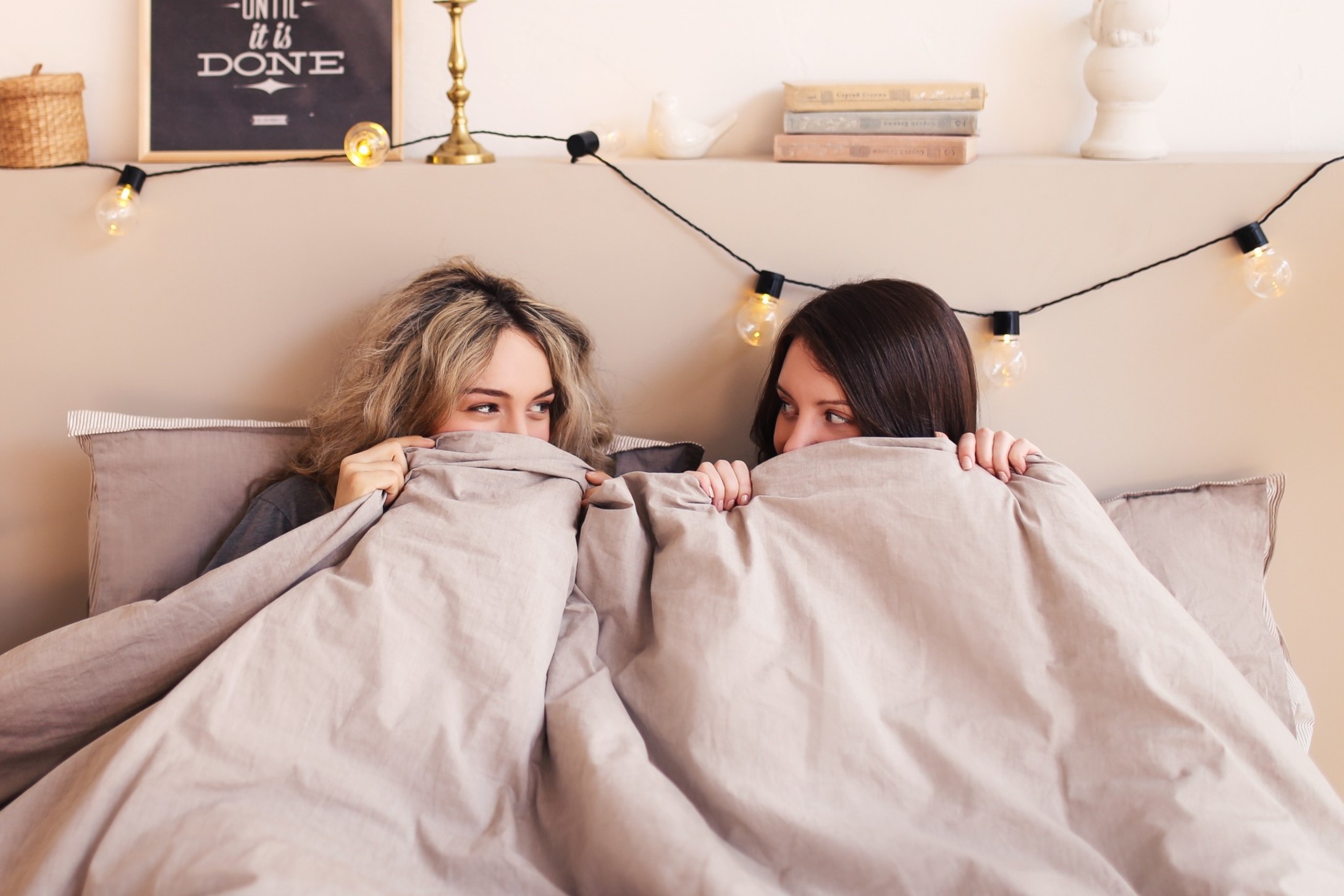 beautiful-funny-cute-happy-girls-blonde-and-brunette-girlfriends-sisters-in-home-clothes-laugh-chat_t20_pL820P.jpg
