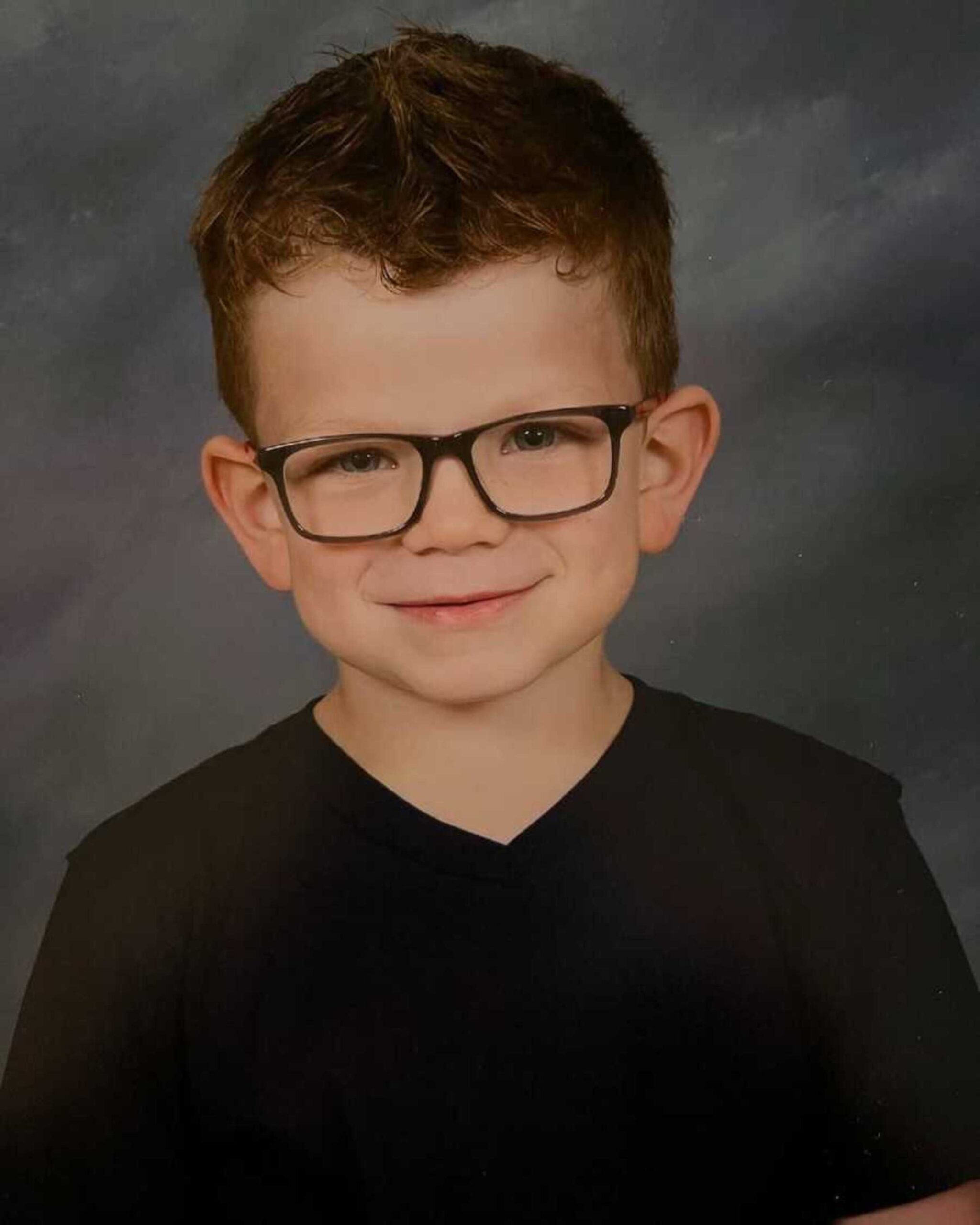 boy-with-sanfilippo-school-portrait-900x1125-1.jpeg