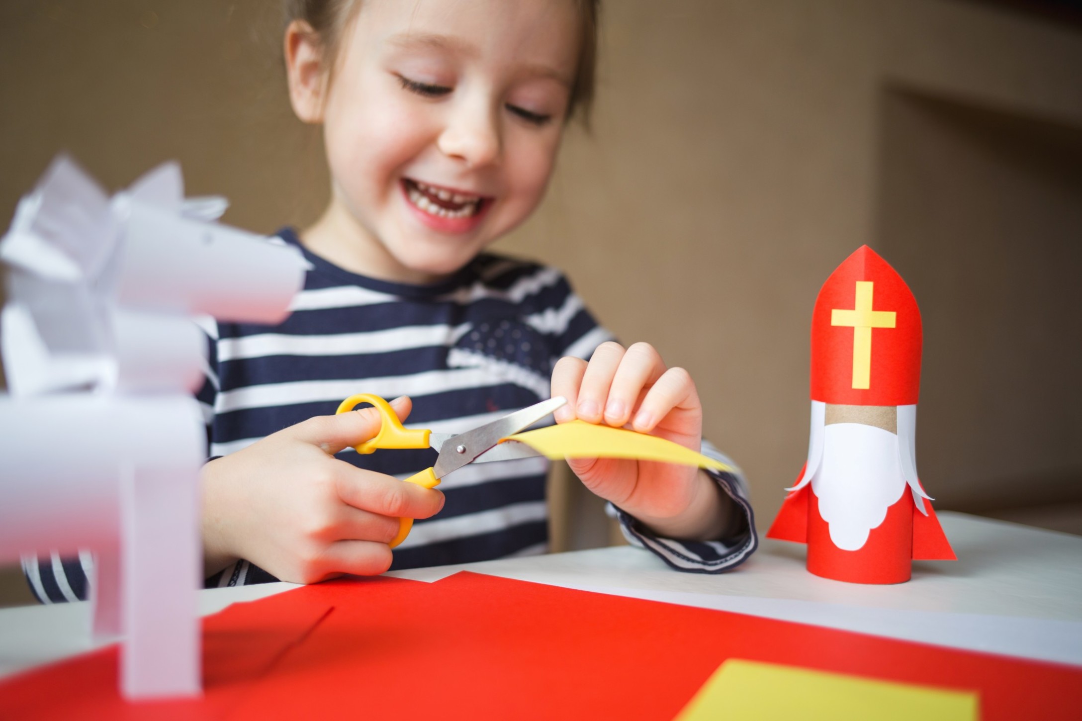 create-art-for-children-happy-girl-cuts-paper-sinterklaas-kid-craft-paper-saint-nicholas-st-nicholas_t20_G02j7e.jpg