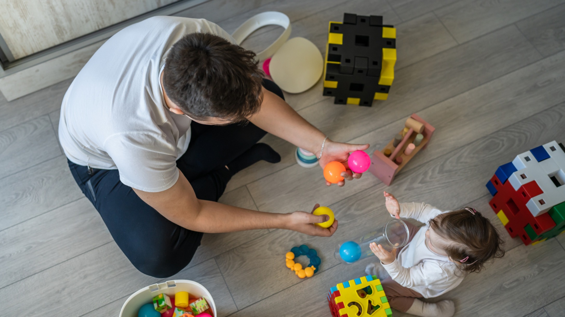 dad playing with child