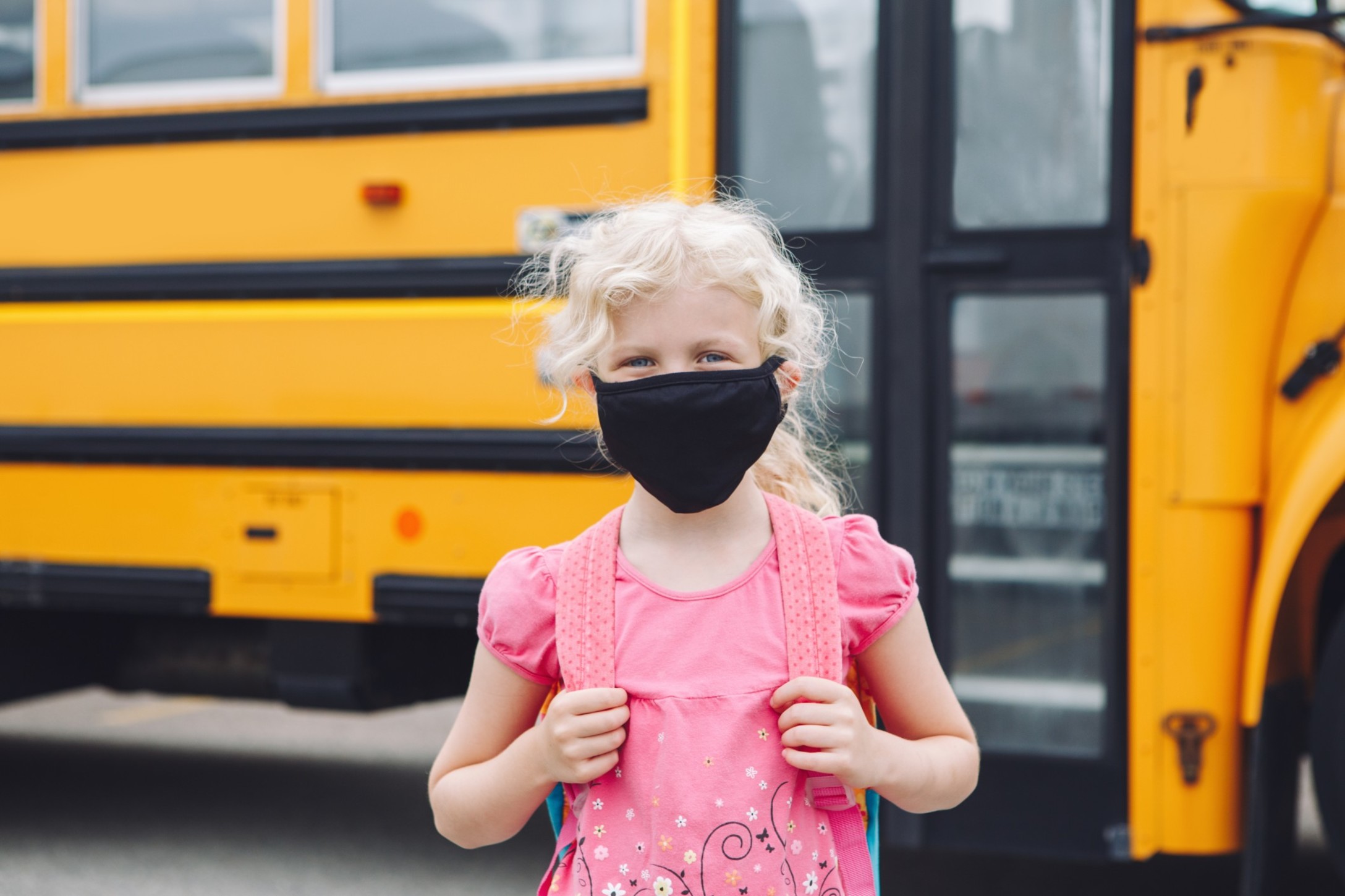 education-back-to-school-girl-yellow-bus-face-mask-coronavirus-new-normal-safety-spread-virus-health_t20_b69XGB.jpg