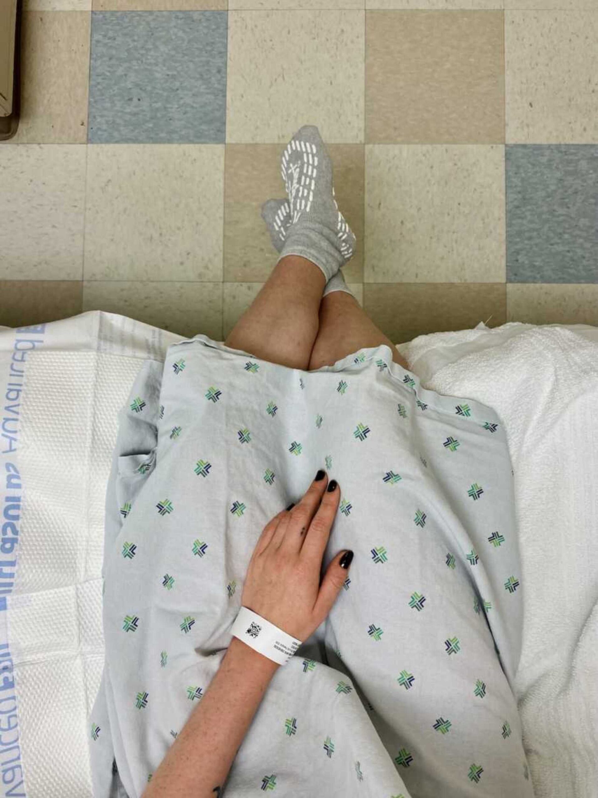 endometriosis-warrior-sitting-on-hospital-bed-900x1200-1.jpeg