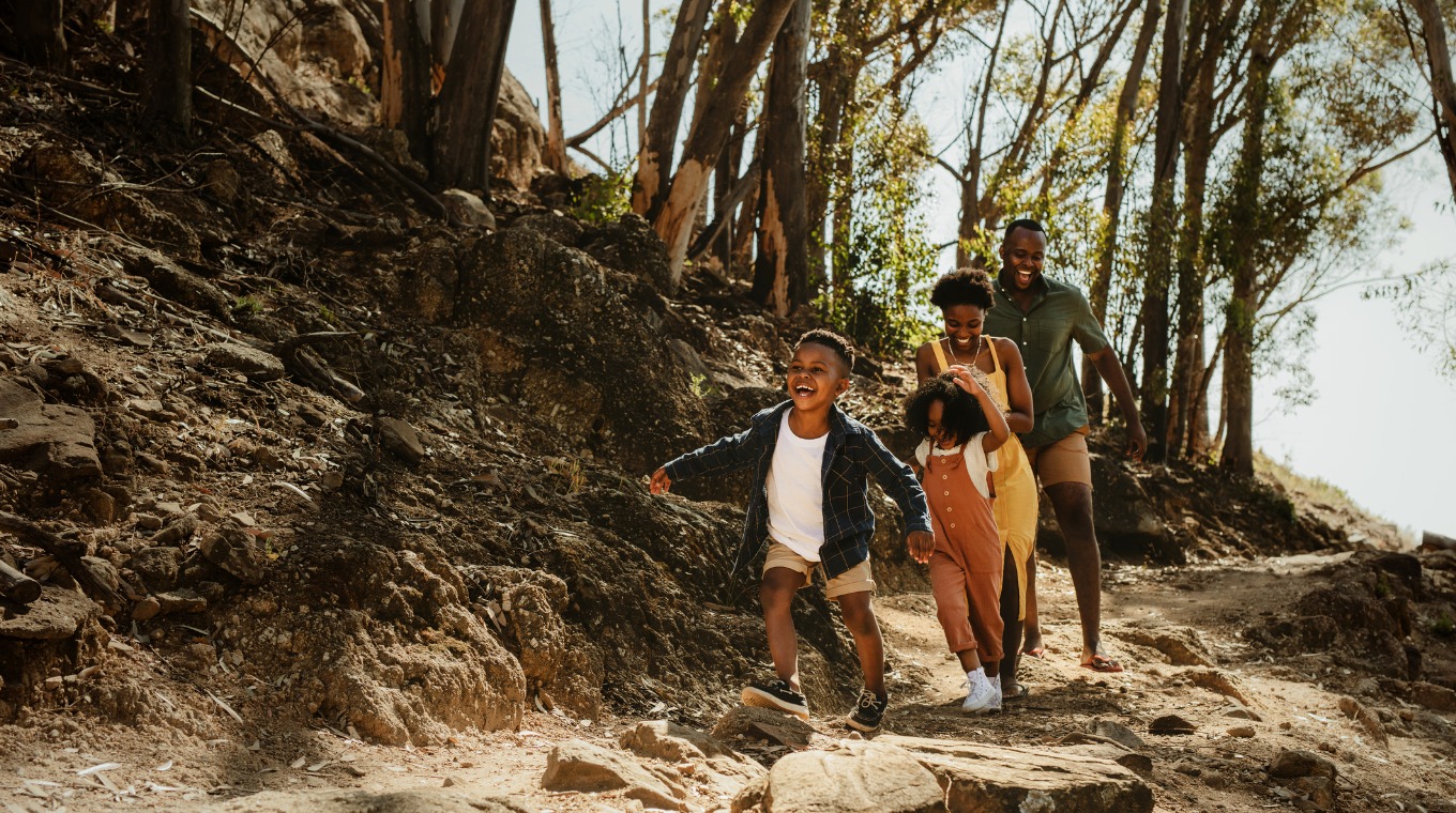 family-running-down-rocky-trail-picture-id1254013331.jpg