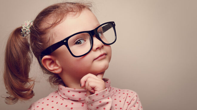 little girl in glasses