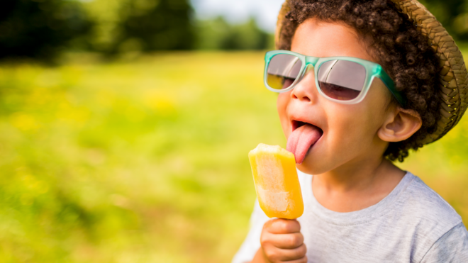 toddler eating a popsicle