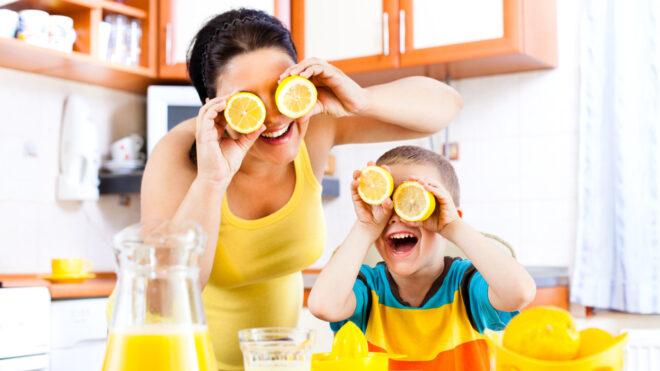 mom and son making lemonade