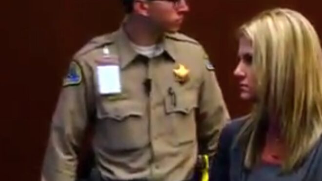 Coral Lytle walks into court during her sentencing hearing.