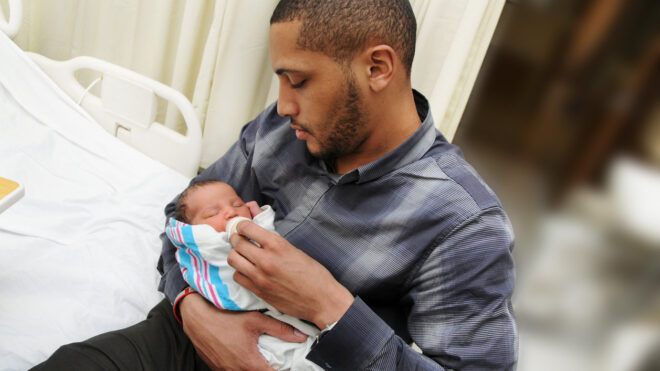 Dad and newborn